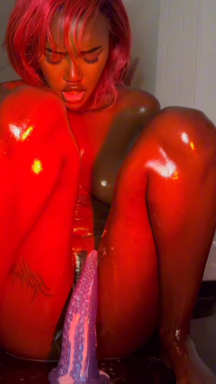 Ebony teen made sure she squirt with her new tentacle toy video poster.